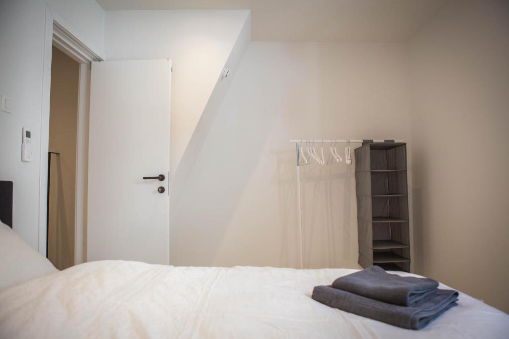 Postel nebo postele na pokoji v ubytování Huis ALNA 1