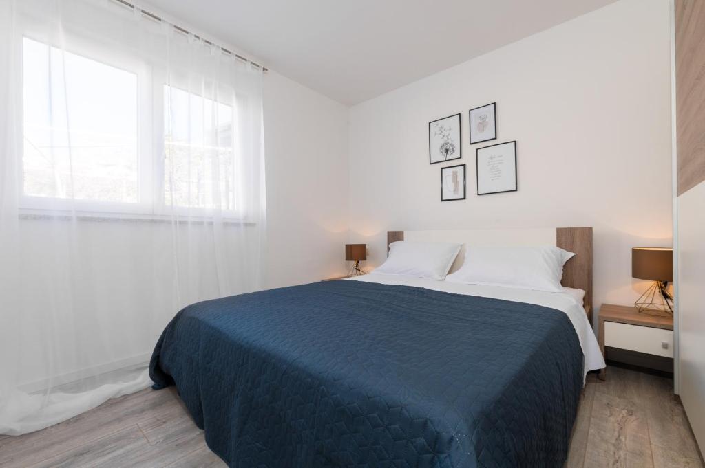 Postel nebo postele na pokoji v ubytování D&A Superior Apartman