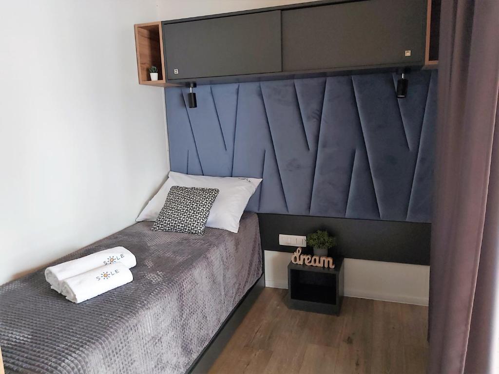 Postel nebo postele na pokoji v ubytování Mobile Home Sole