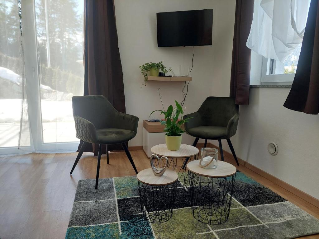 A television and/or entertainment centre at Appartement Naturnah