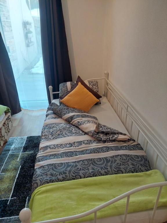 A bed or beds in a room at Appartement Naturnah