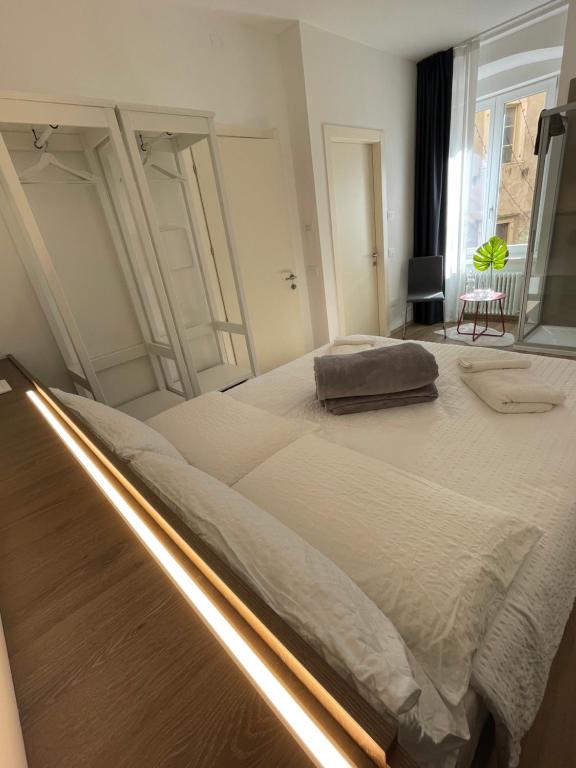 Postel nebo postele na pokoji v ubytování Al Palazzo