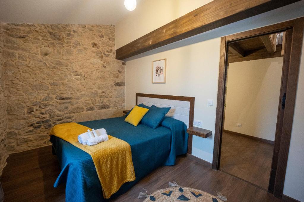 Posteľ alebo postele v izbe v ubytovaní A de Pepita, Turismo Rural en Padrón by URent