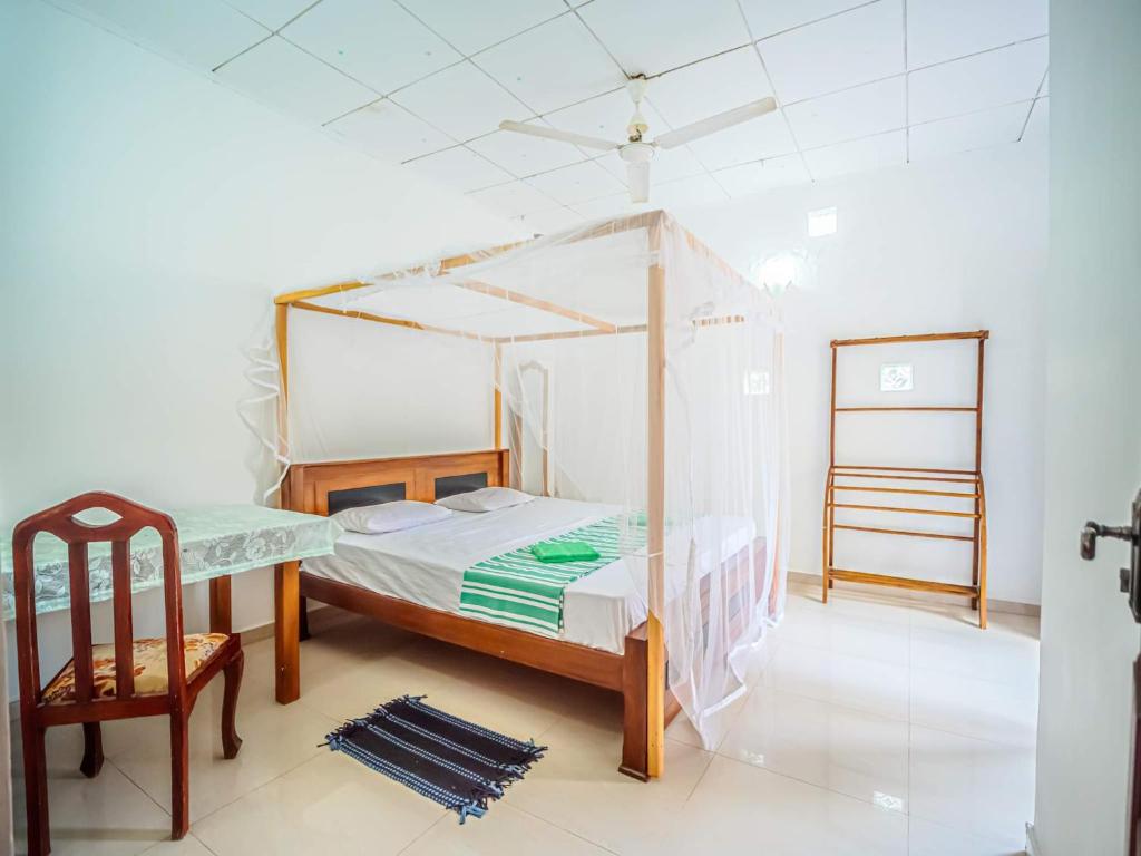 Postel nebo postele na pokoji v ubytování Surfing Guest House