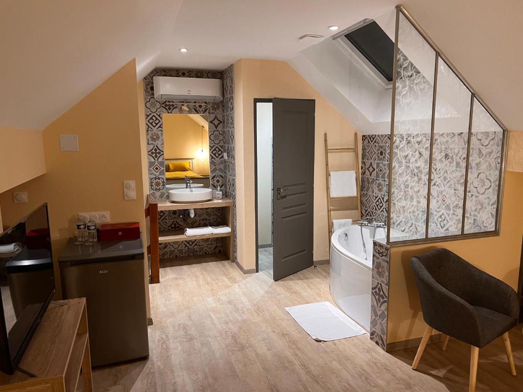 Kuchyň nebo kuchyňský kout v ubytování OLGA Chambre D'hôte