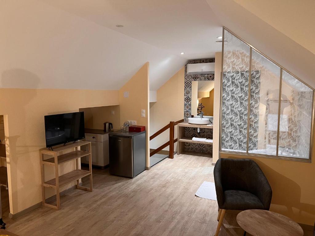 Postel nebo postele na pokoji v ubytování OLGA Chambre D'hôte