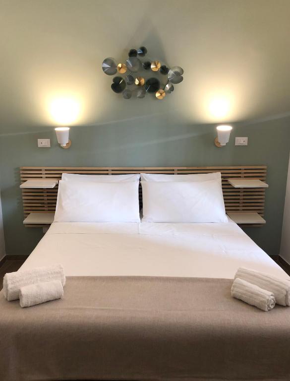 Postel nebo postele na pokoji v ubytování B&B Angolo83 Palermo centro