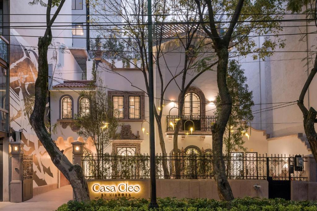 a building with a casa cloe sign in front of it at Casa Cleo by Viadora in Mexico City