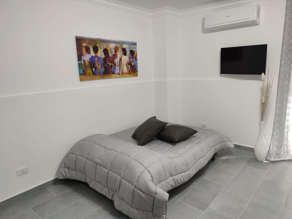 Posteľ alebo postele v izbe v ubytovaní Maya's Home
