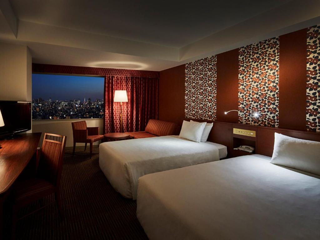 Postel nebo postele na pokoji v ubytování Tobu Hotel Levant Tokyo