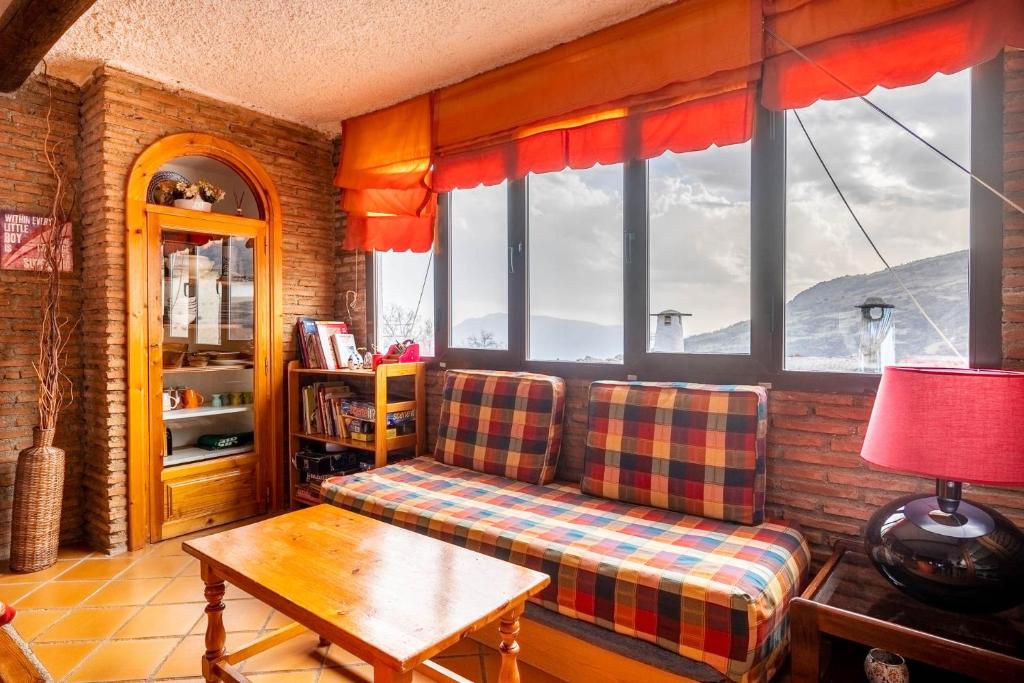A seating area at Alojamiento Rural Cuatro Estaciones