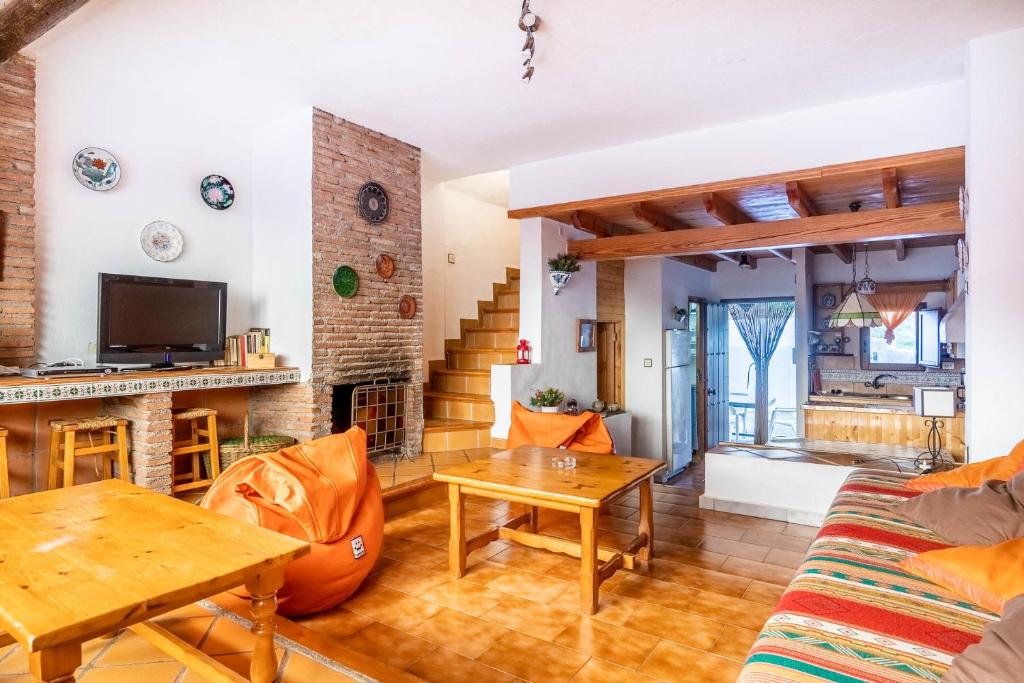 A television and/or entertainment centre at Alojamiento Rural Cuatro Estaciones