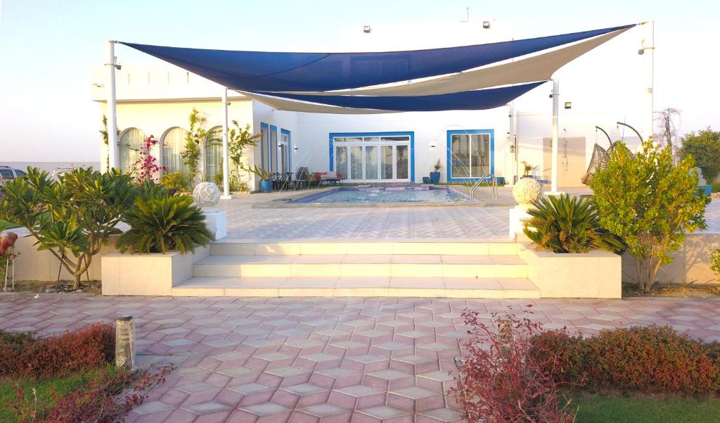 Zahrada ubytování Luxury Farm Villa in Musanaa Oman