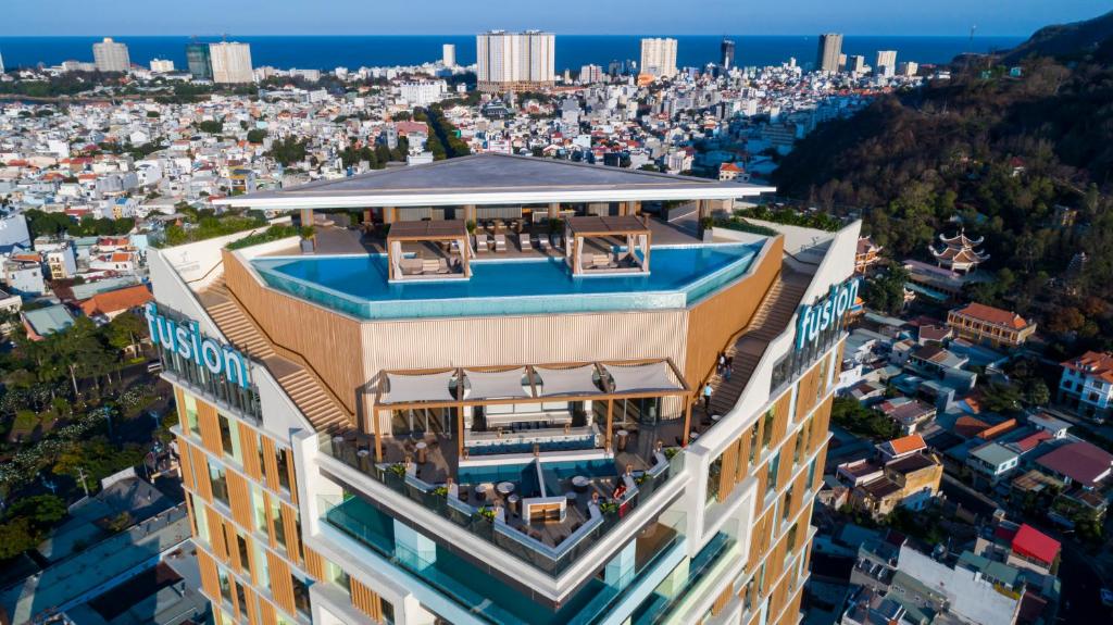 an aerial view of a building with a pool at Fusion Suites Vung Tau in Vung Tau