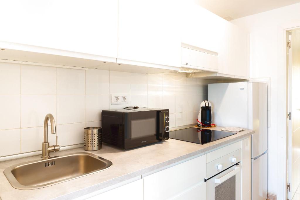Kuchyň nebo kuchyňský kout v ubytování Casa Margherita
