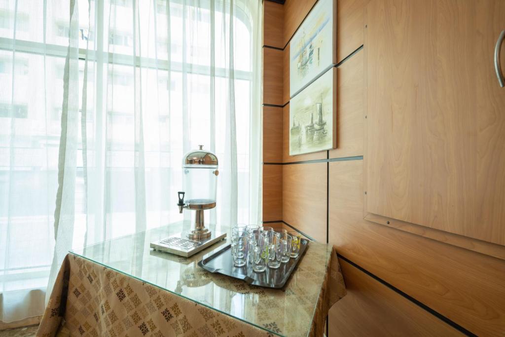 Kuchyň nebo kuchyňský kout v ubytování Pearl Swiss Hotel