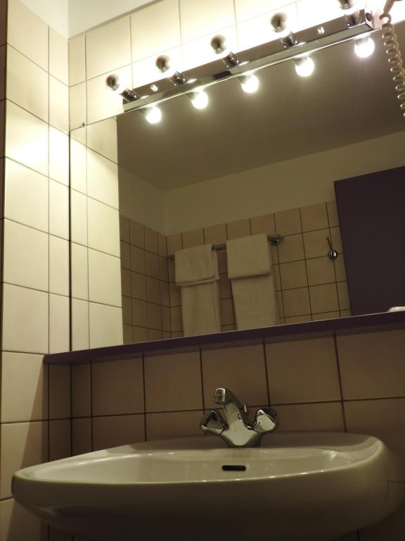 Koupelna v ubytování Au Bon Gîte