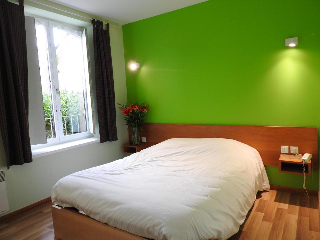 Postel nebo postele na pokoji v ubytování Au Bon Gîte
