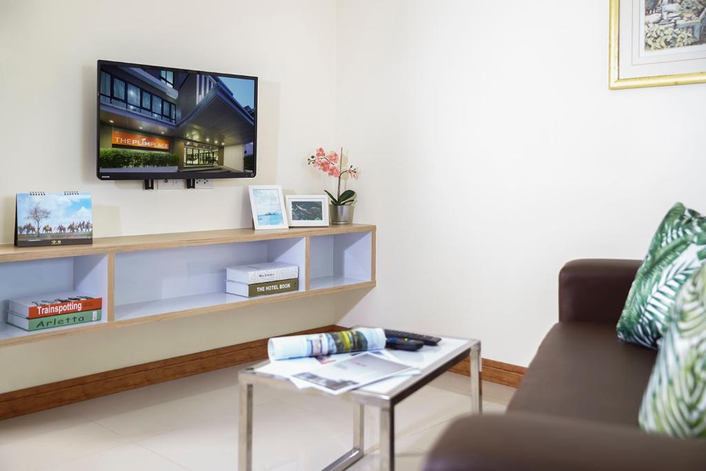 TV a/nebo společenská místnost v ubytování The Plimplace Hotel