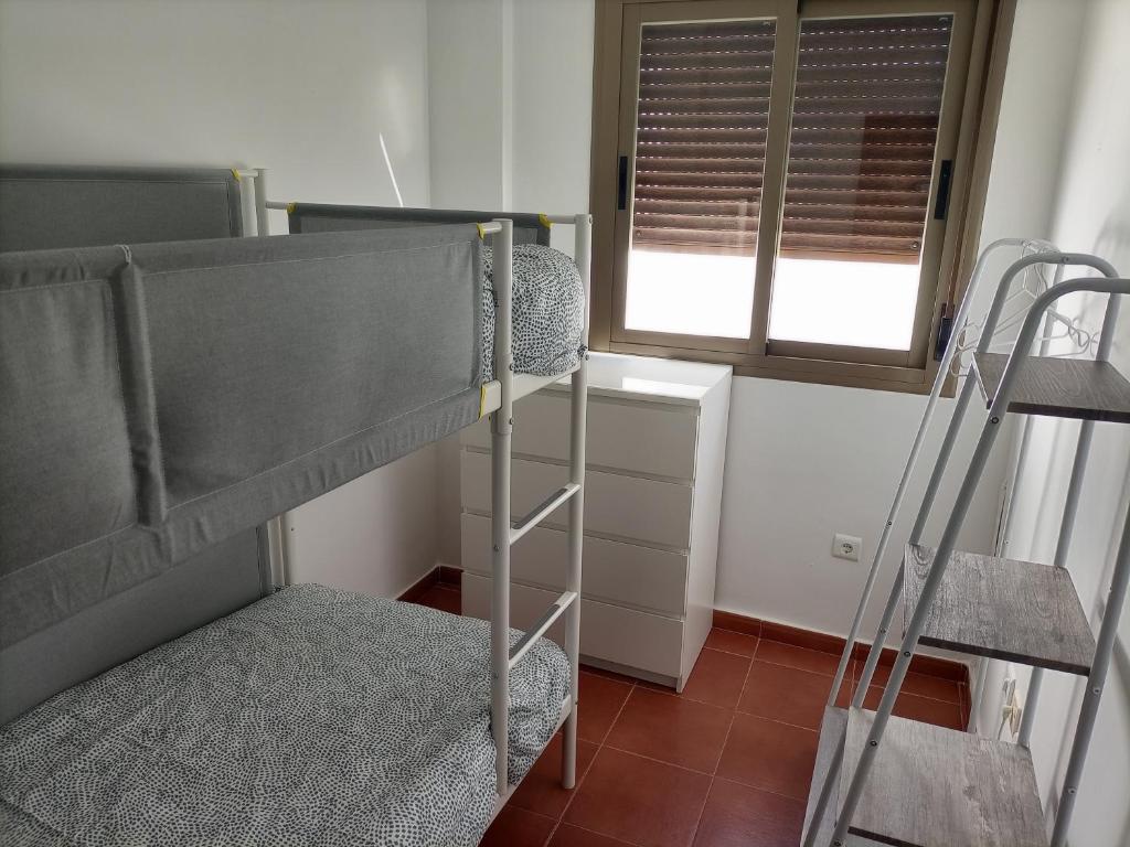 Postel nebo postele na pokoji v ubytování Apartamento click center