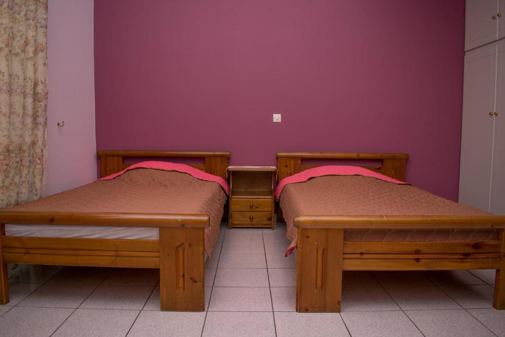 Postel nebo postele na pokoji v ubytování ΑΚΤΗ ΞΟΒΡΙΟΣ