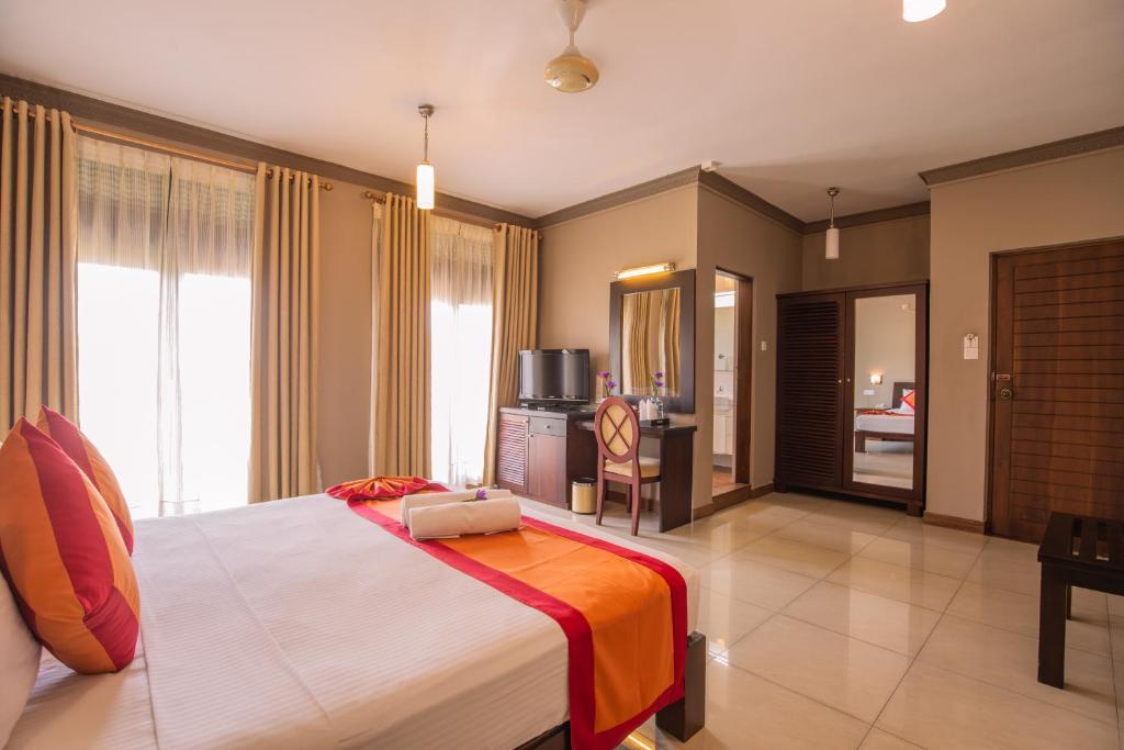 Postel nebo postele na pokoji v ubytování Kings Ridge Kandy