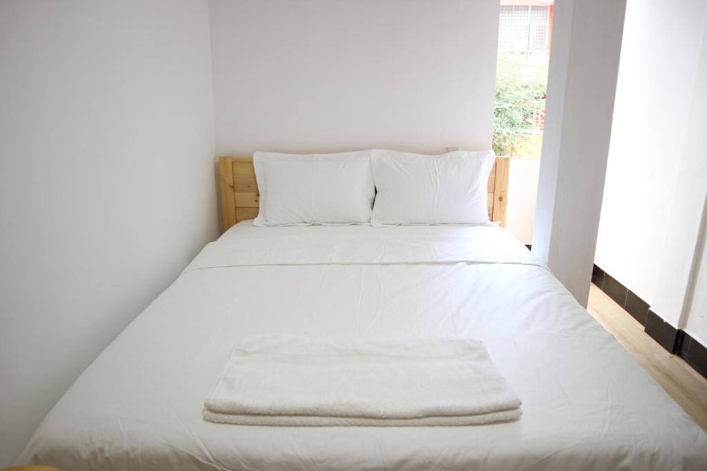Voodi või voodid majutusasutuse Loan Võ hostel toas