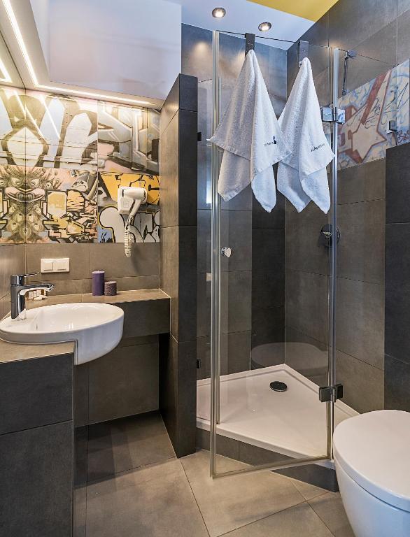Kúpeľňa v ubytovaní JJ Sport Concept Hotel