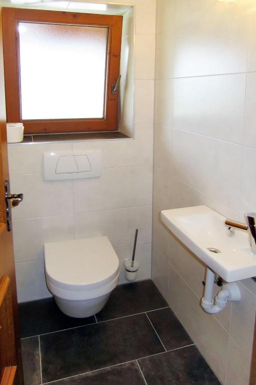 Koupelna v ubytování Apartment Häuser-1 by Interhome