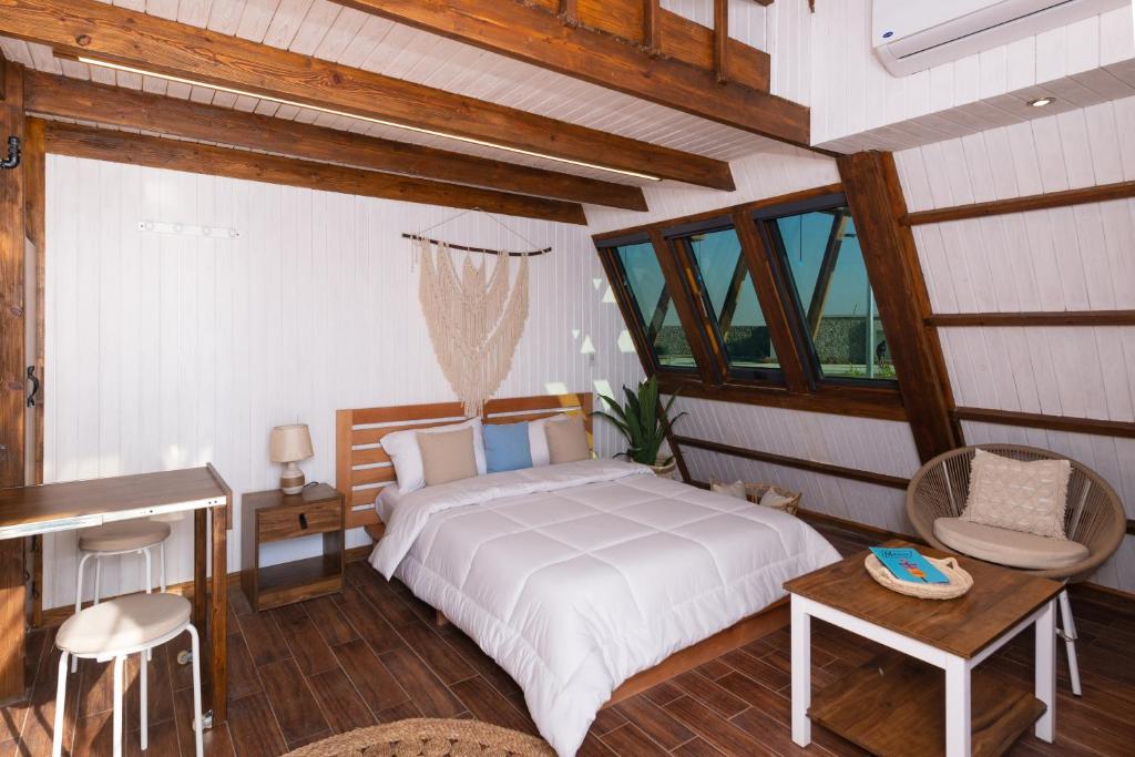 Postel nebo postele na pokoji v ubytování Matarma Beach Residence