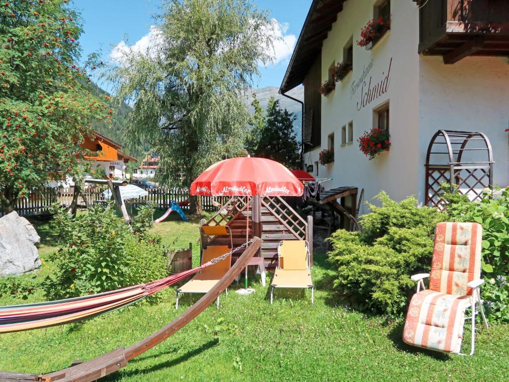 A garden outside Apartment Haflingerhof Almrose by Interhome