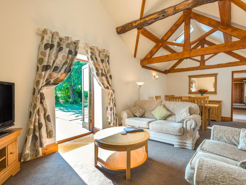 Posezení v ubytování Parrs Meadow Cottage