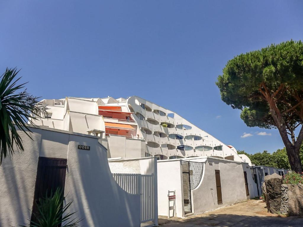 a building with a skate ramp in front of it at Apartment Le Viking by Interhome in La Grande Motte