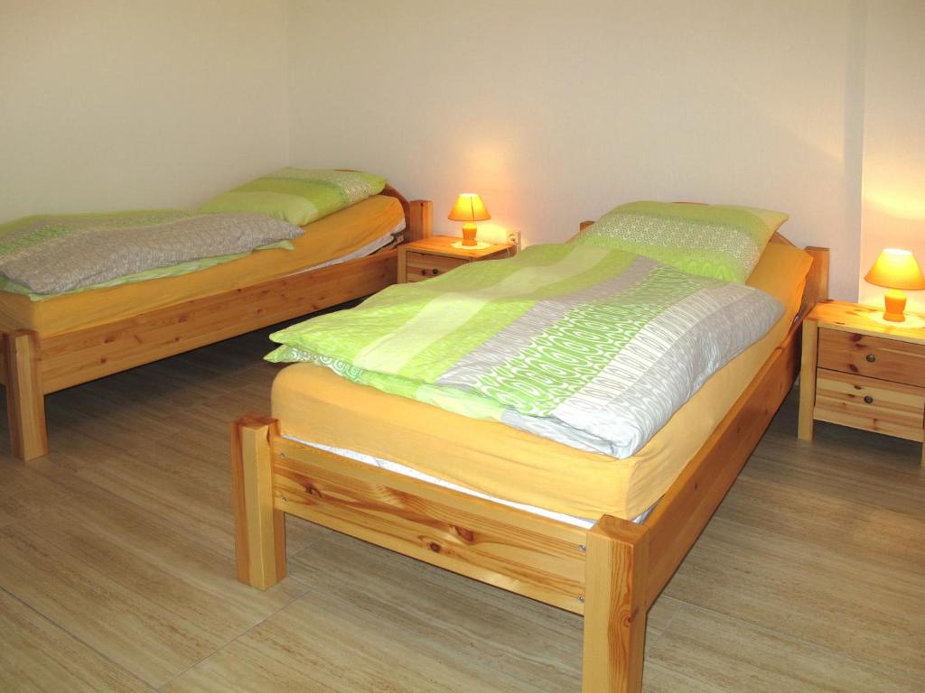 Postel nebo postele na pokoji v ubytování Apartment Am Burgberg by Interhome