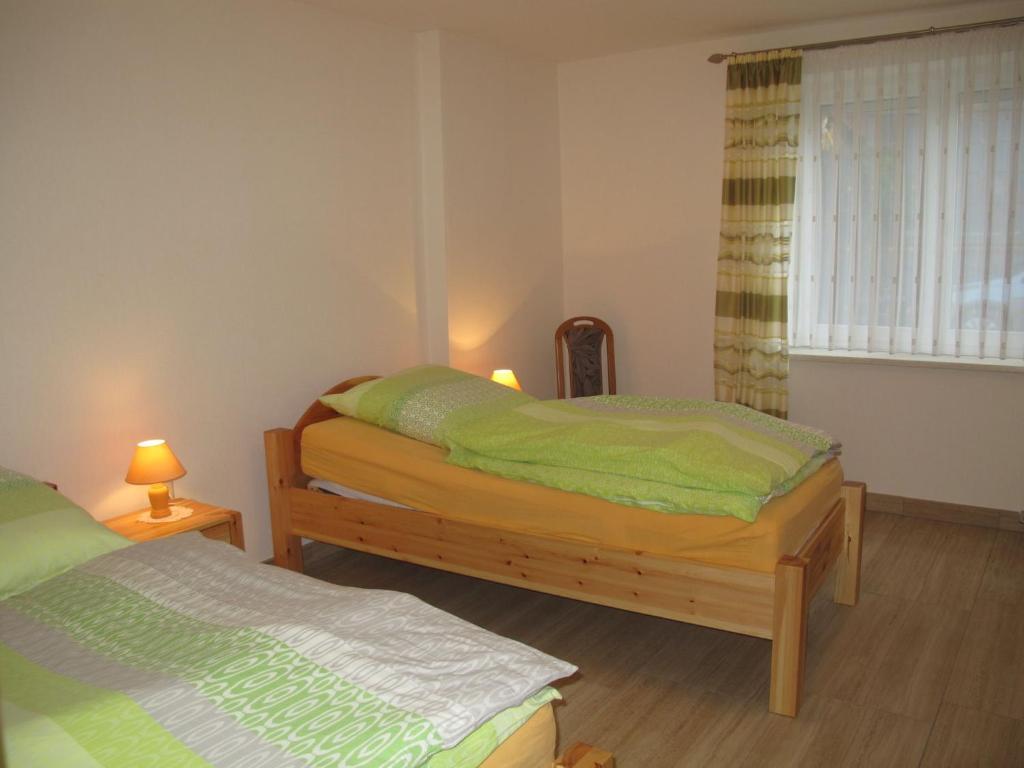 Postel nebo postele na pokoji v ubytování Apartment Am Burgberg by Interhome