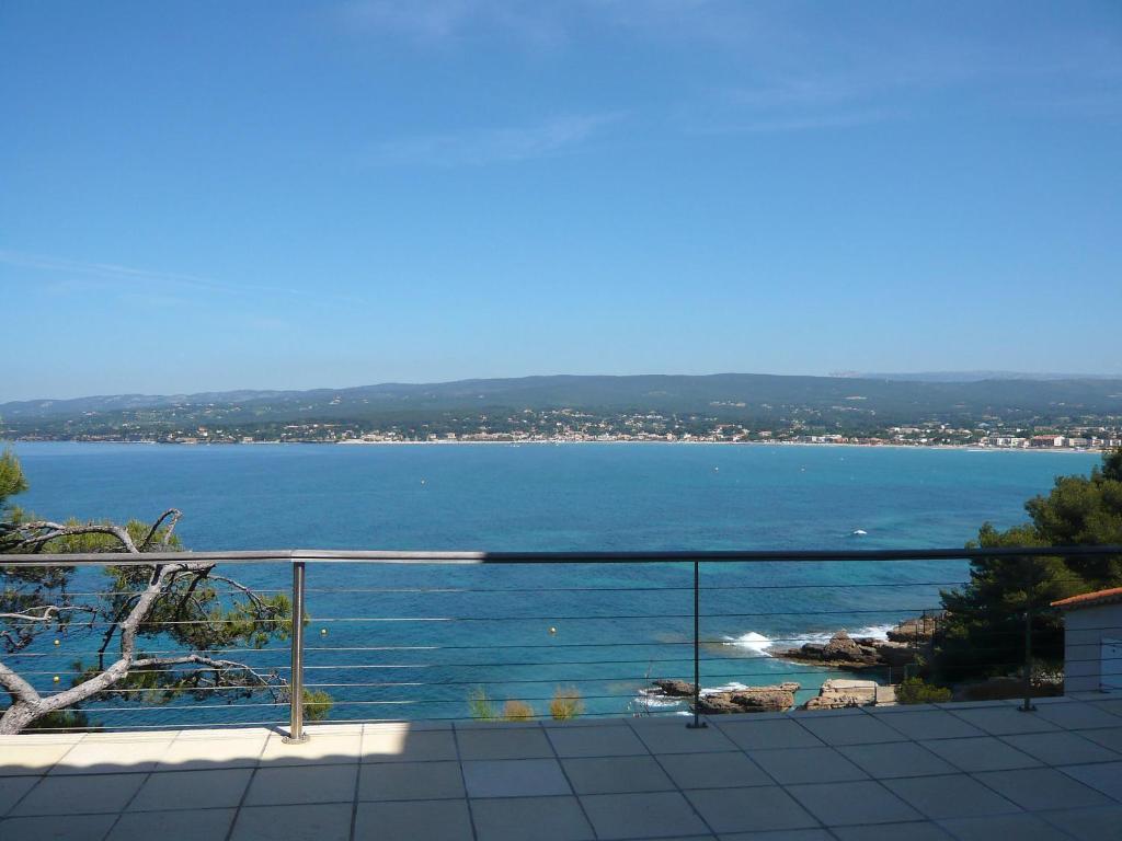 a view of the ocean from a balcony at Apartment Campagne la Source by Interhome in La Madrague