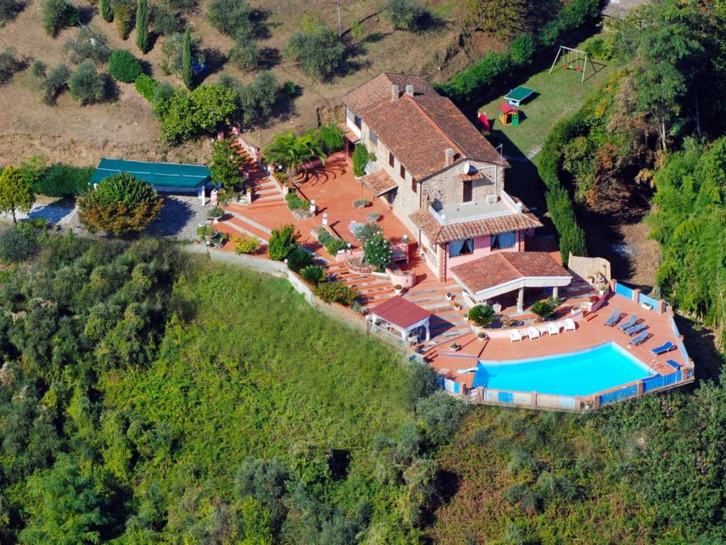 an aerial view of a house with a swimming pool at Villa La Chiazza by Interhome in Corsanico-Bargecchia