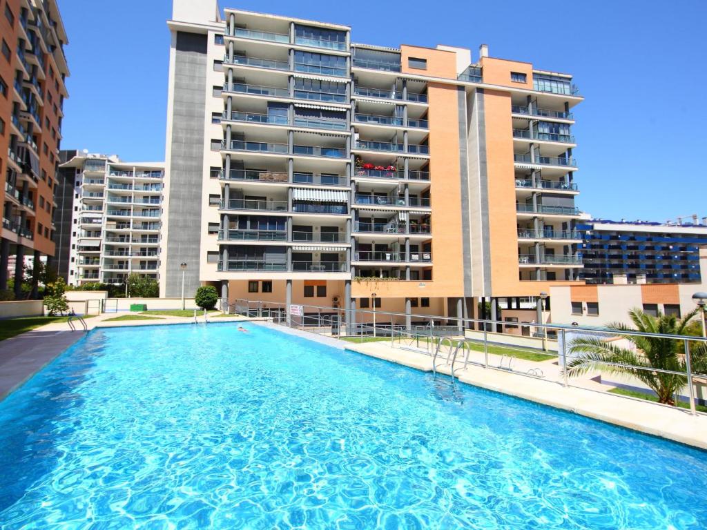 a large swimming pool in front of a building at Apartment Tamarindo by Interhome in Cala de Finestrat