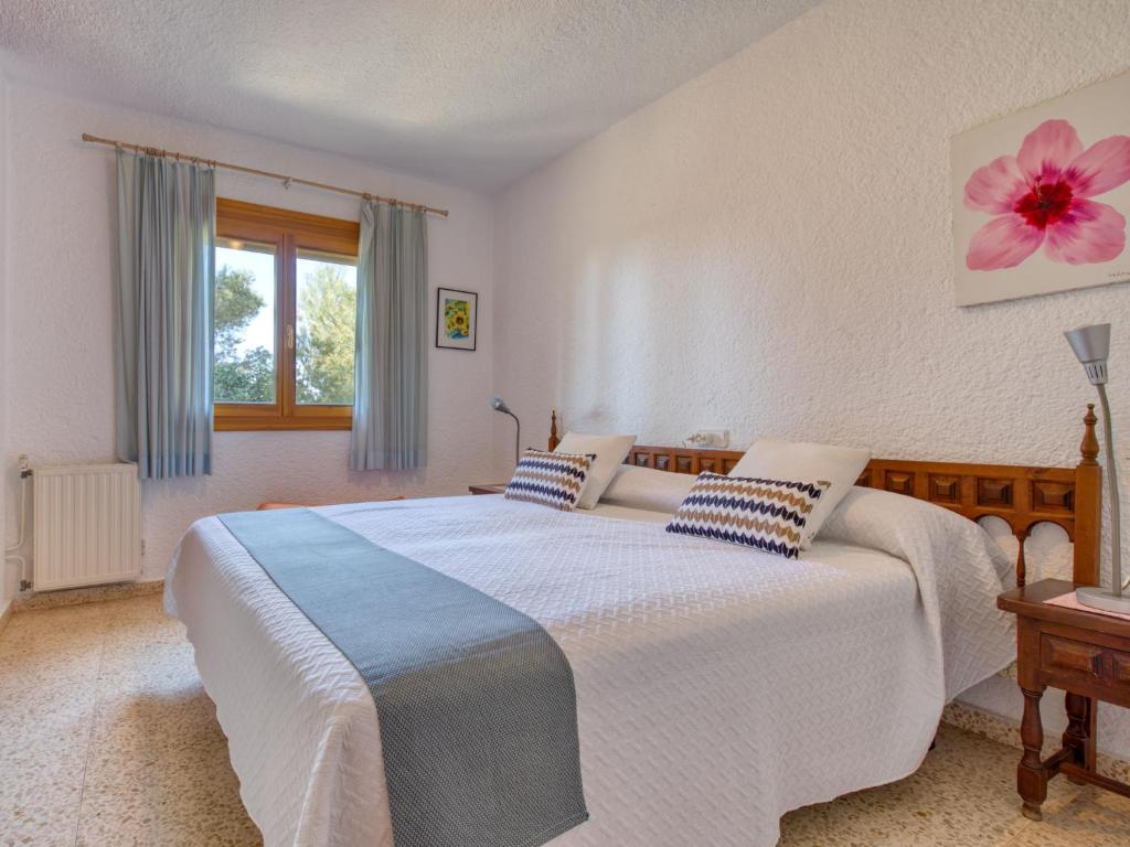 Postel nebo postele na pokoji v ubytování Holiday Home Marina by Interhome