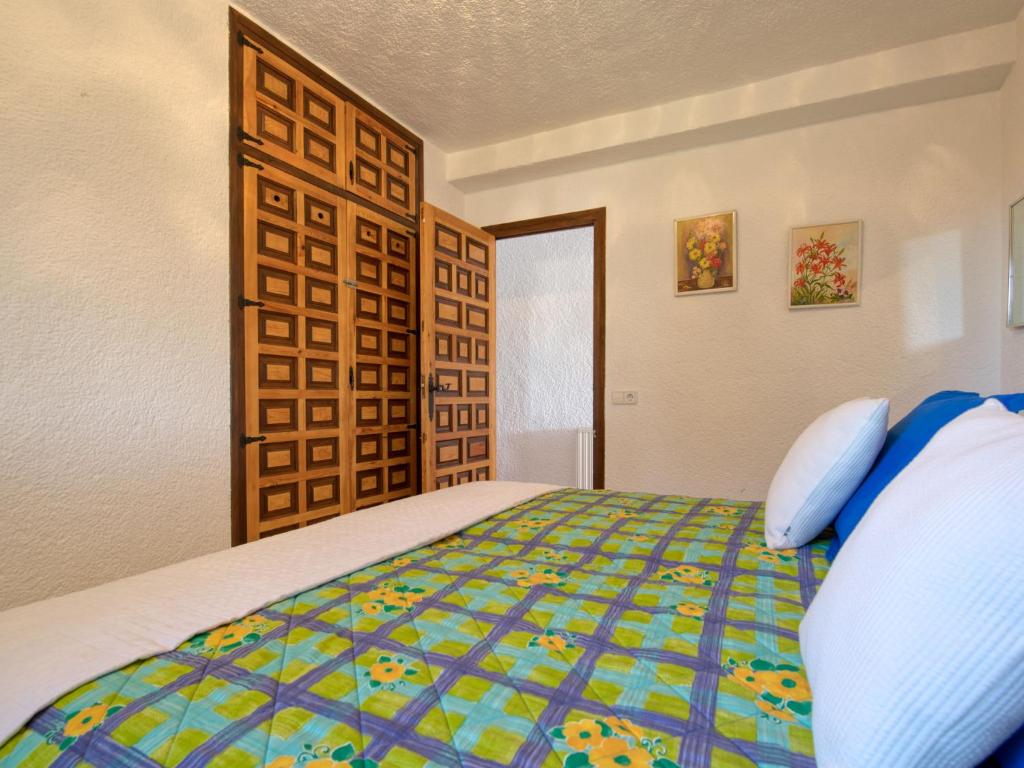 Postel nebo postele na pokoji v ubytování Holiday Home Marina by Interhome