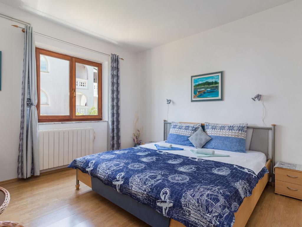 Posteľ alebo postele v izbe v ubytovaní Apartment Bellevue-2 by Interhome