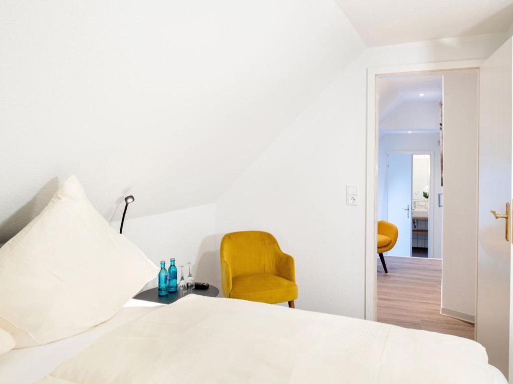 Postel nebo postele na pokoji v ubytování Hotel Busch