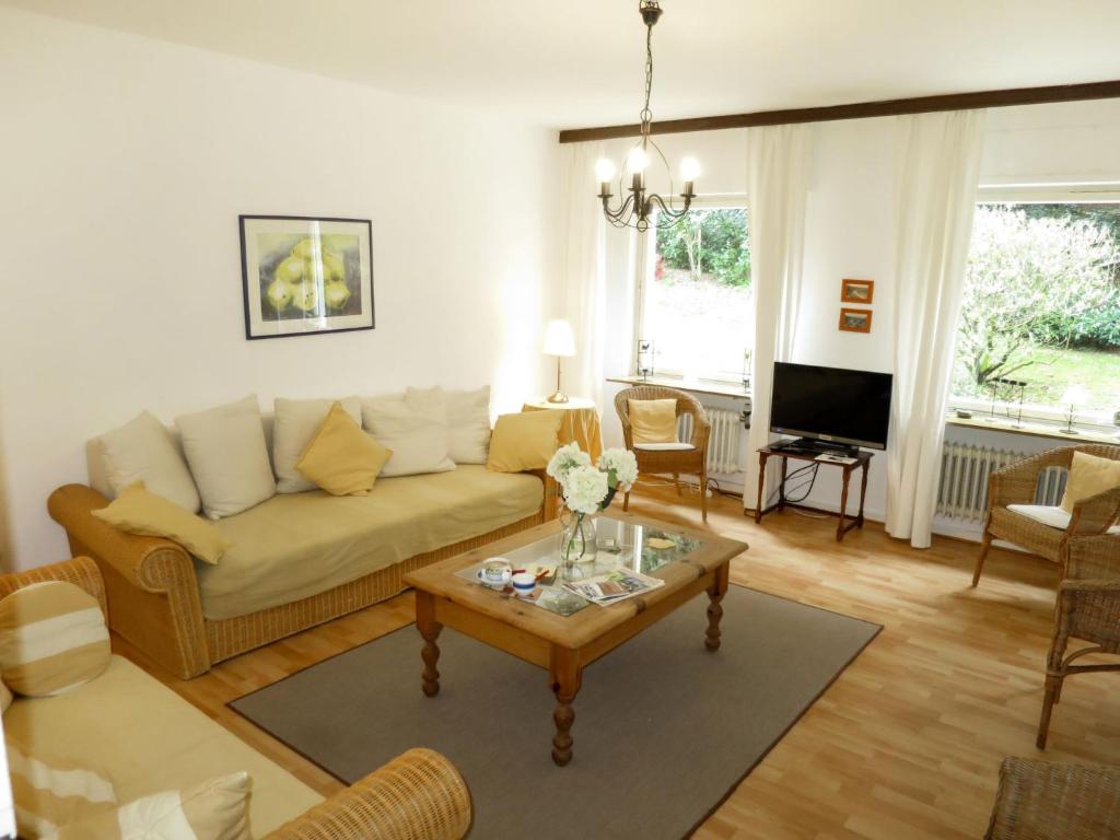 a living room with a couch and a coffee table at Apartment Wildbadstrasse by Interhome in Traben-Trarbach