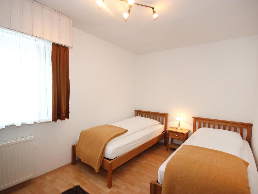 Posteľ alebo postele v izbe v ubytovaní Apartment Am Birkenhain-2 by Interhome