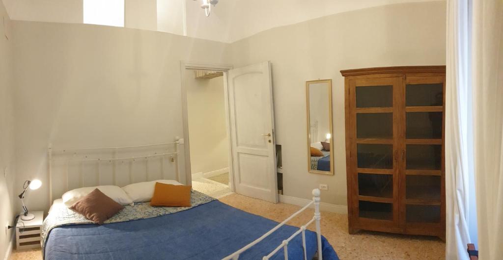 A bed or beds in a room at Casa Tua a Santa Maria Maggiore