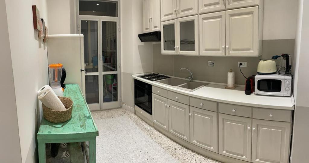 A kitchen or kitchenette at Casa Tua a Santa Maria Maggiore