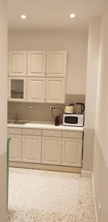 A kitchen or kitchenette at Casa Tua a Santa Maria Maggiore