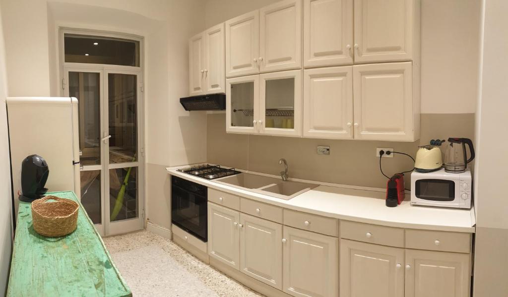 A kitchen or kitchenette at Casa Tua a Santa Maria Maggiore