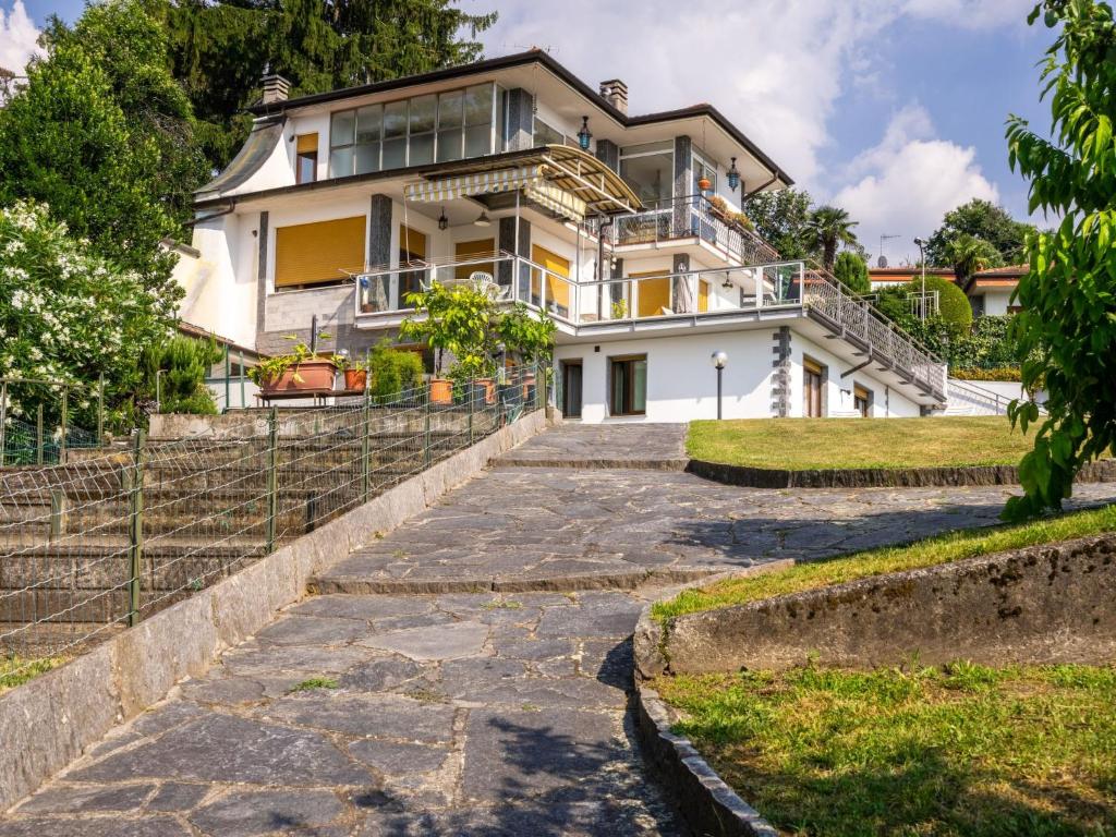 a house on the top of a hill at Apartment Malpensata by Interhome in Porto Valtravaglia