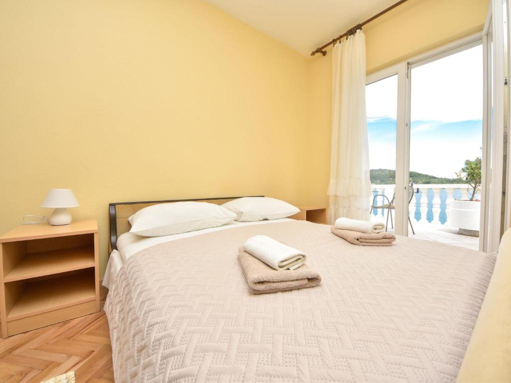 Postel nebo postele na pokoji v ubytování Holiday Home Ana by Interhome